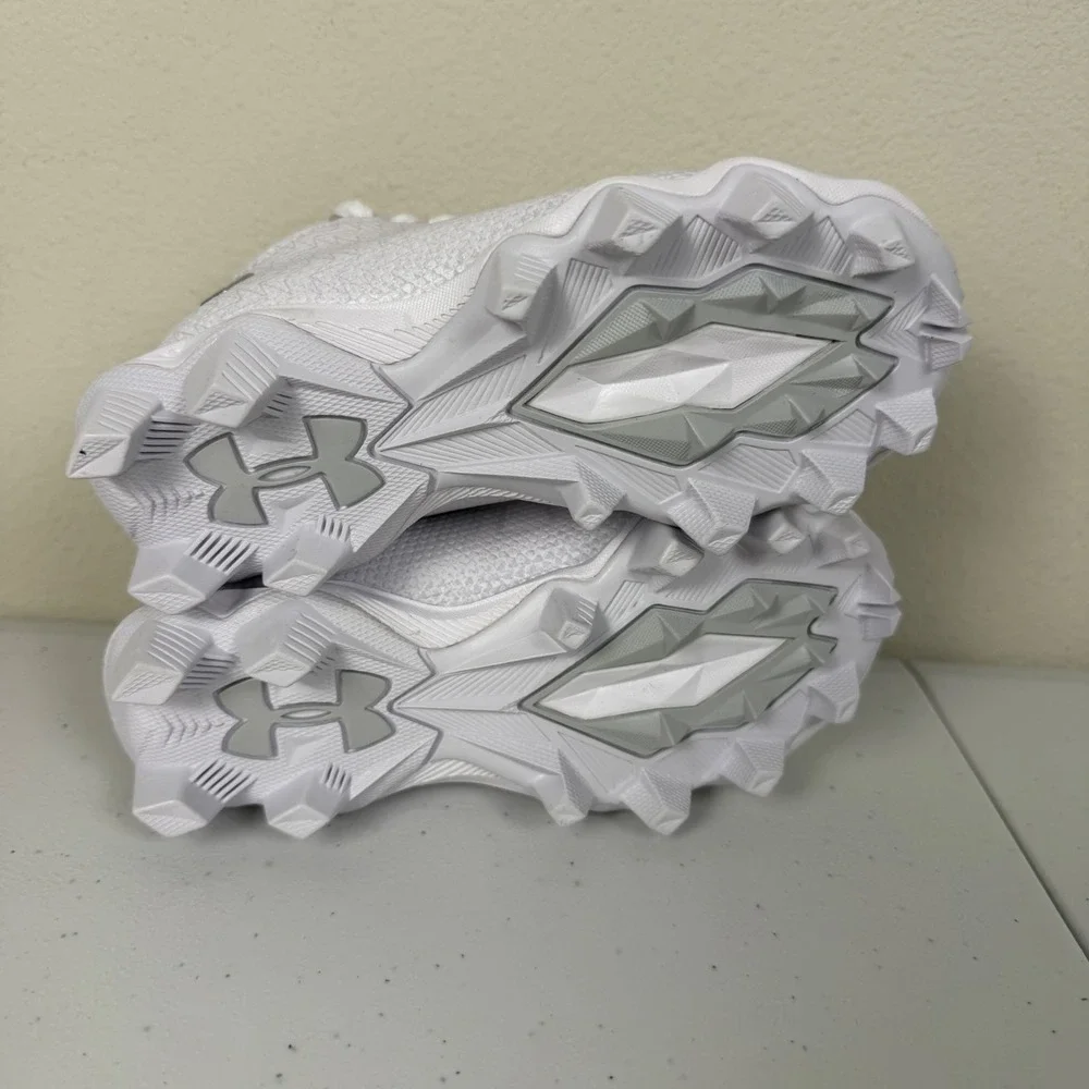 Under Armour White Kids Cleat Sneakers with Silver Logo